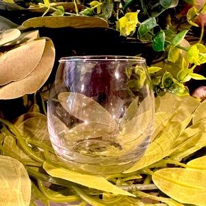 Lot of 48 clear glass votive holders. (No candles included)